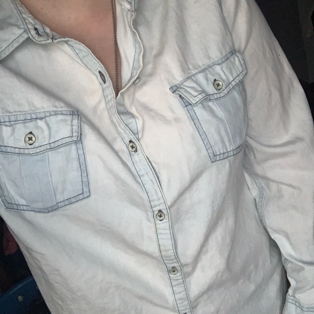 Light blue colored button up shirt